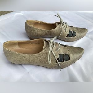 Fidji, tan and brown, size 8.5, great condition.